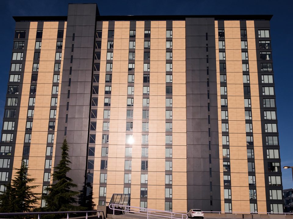 wide beige and grey building shot