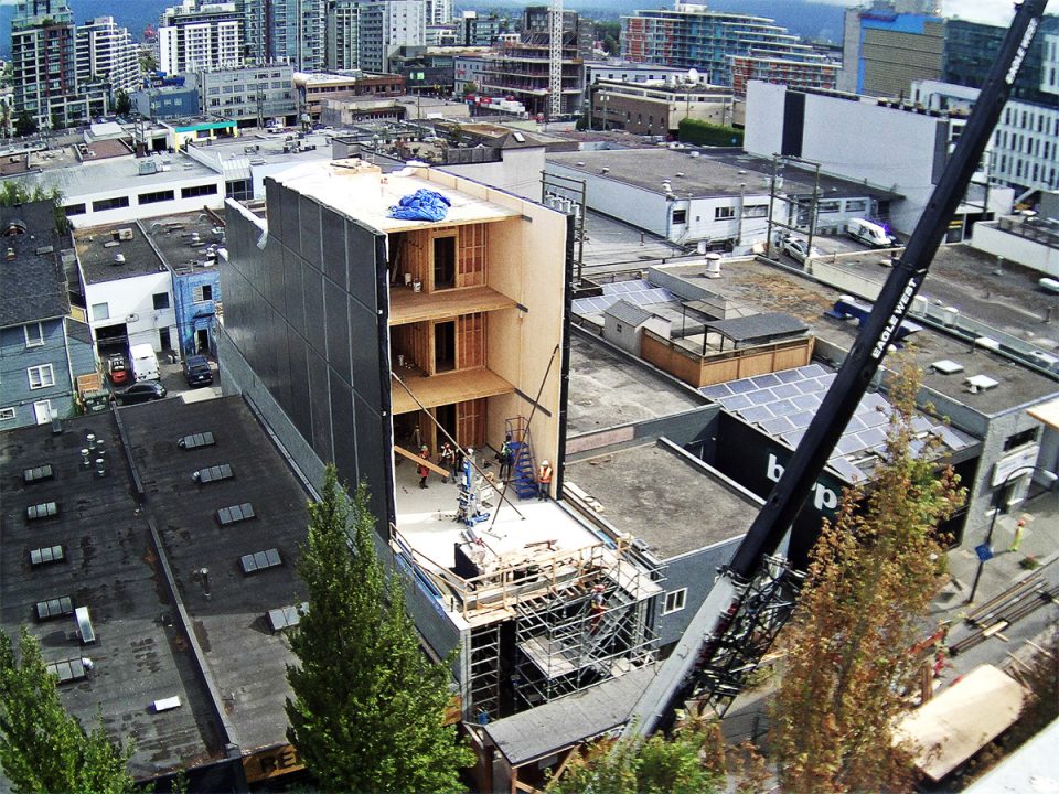 Construction site of a grey building